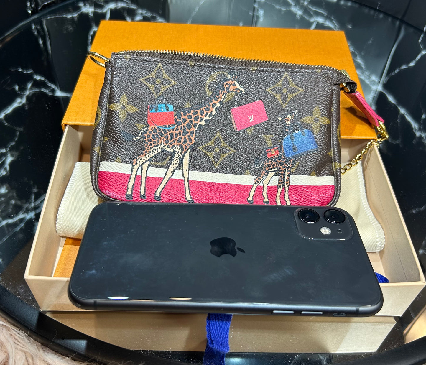 Louis Vuitton Mini Pochette Accessoires – Christmas Edition (Giraffes Print)